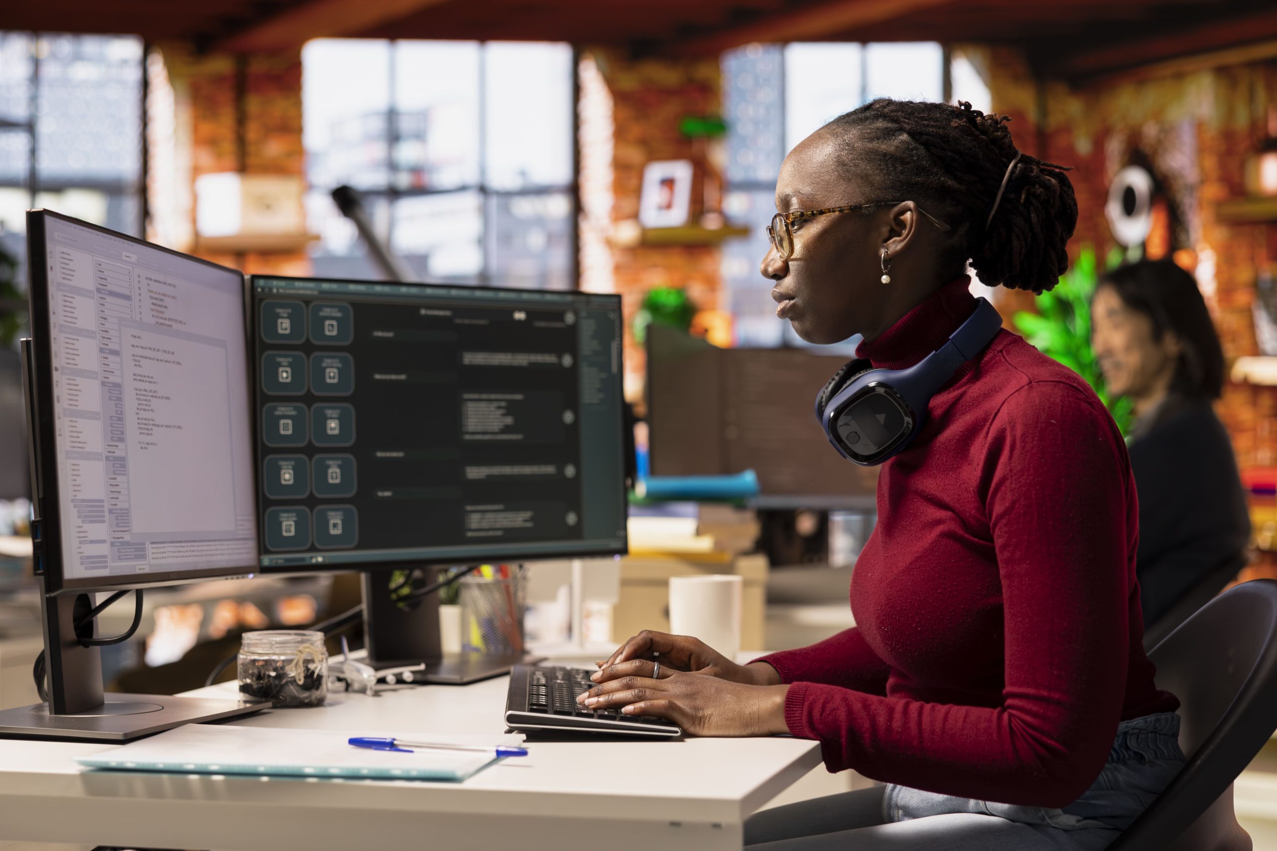 it-expert-interacting-with-ai-llm-chatbot-pc-software-development-startup (1)